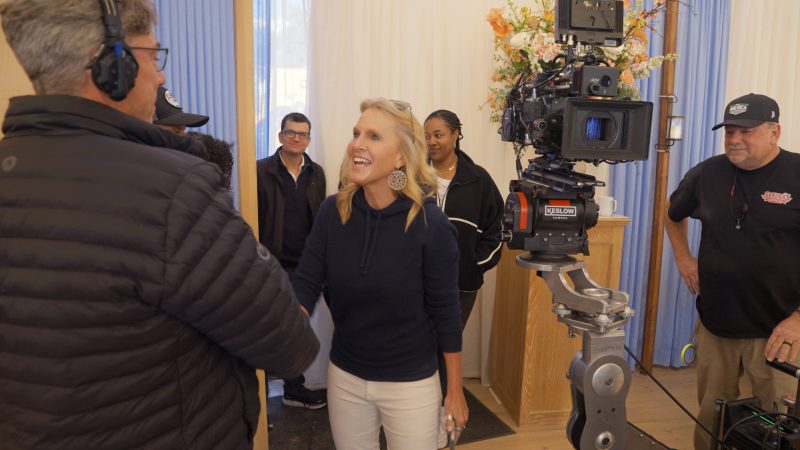 The Perfect Couple. (L to R) Director of Photography Shane Hurlbut, Writer Elin Hilderbrand on the set of The Perfect Couple. Cr. Courtesy of Netflix © 2024