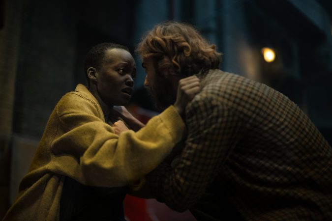 Lupita Nyong’o as “Samira” and Alex Wolff as “Reuben” in A Quiet Place: Day One from Paramount Pictures.